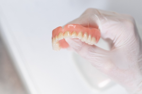 How Denture Adjustments Can Help With Sore Spots